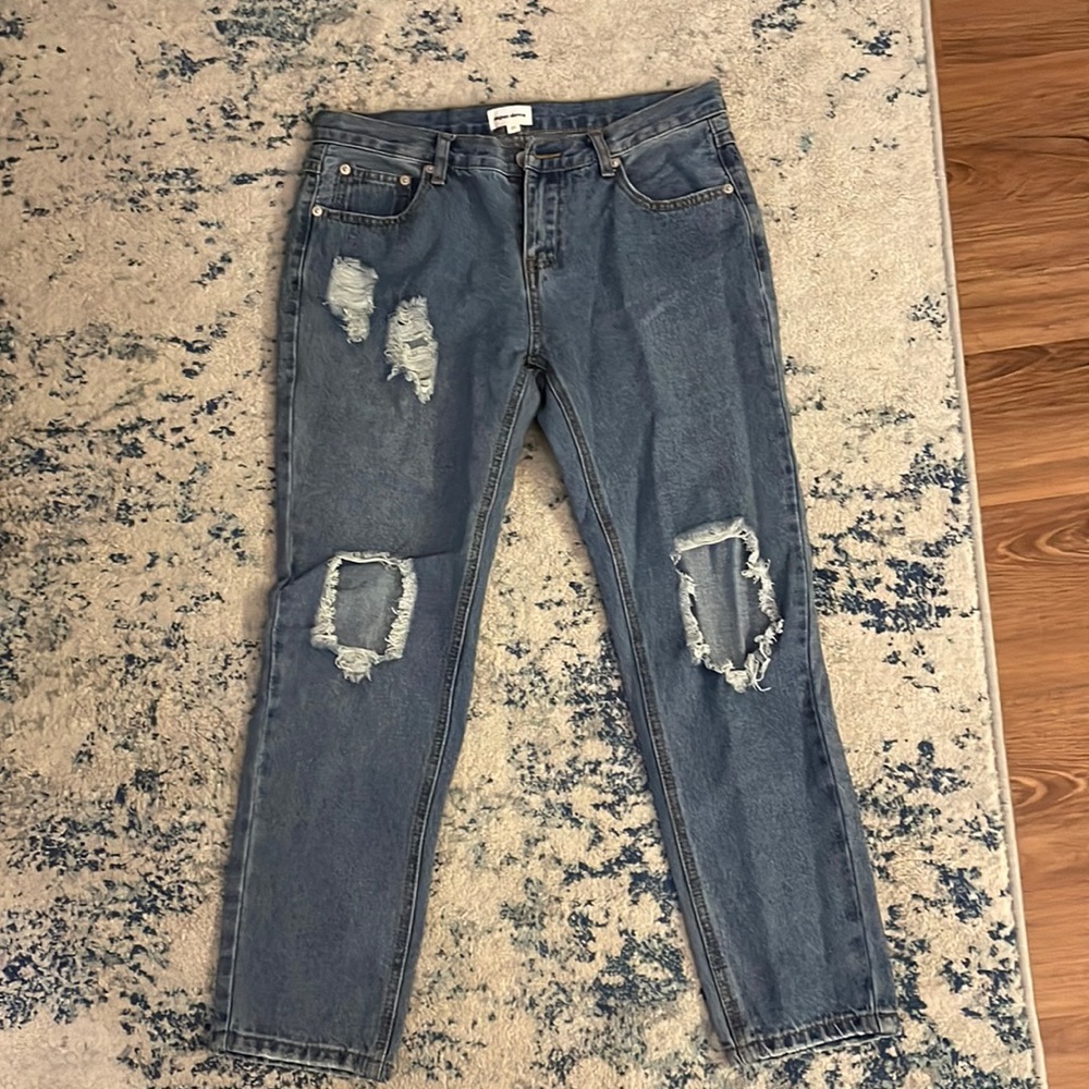 Light blue ripped jeans